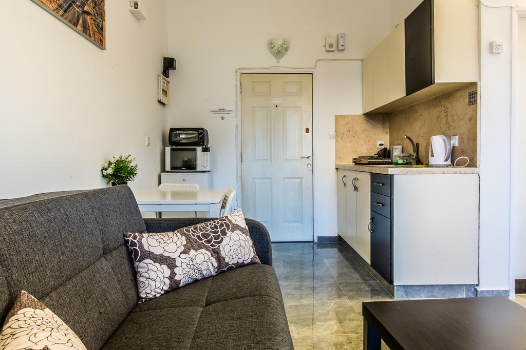 Sunset Beach Apartments テル・アビブ エクステリア 写真